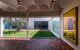 Interior gallery looking to an empty courtyard