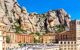 panoramic of the monastery in front of the cliff