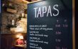 Chalkboard menu showing tapas selections