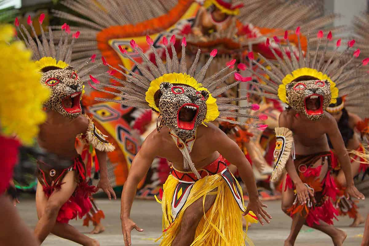 Male dancers in very exotic jaguar animal costumes and headdresses perform in the colourful Boi Bumba folklore Festival in Parintins, Amazonas State