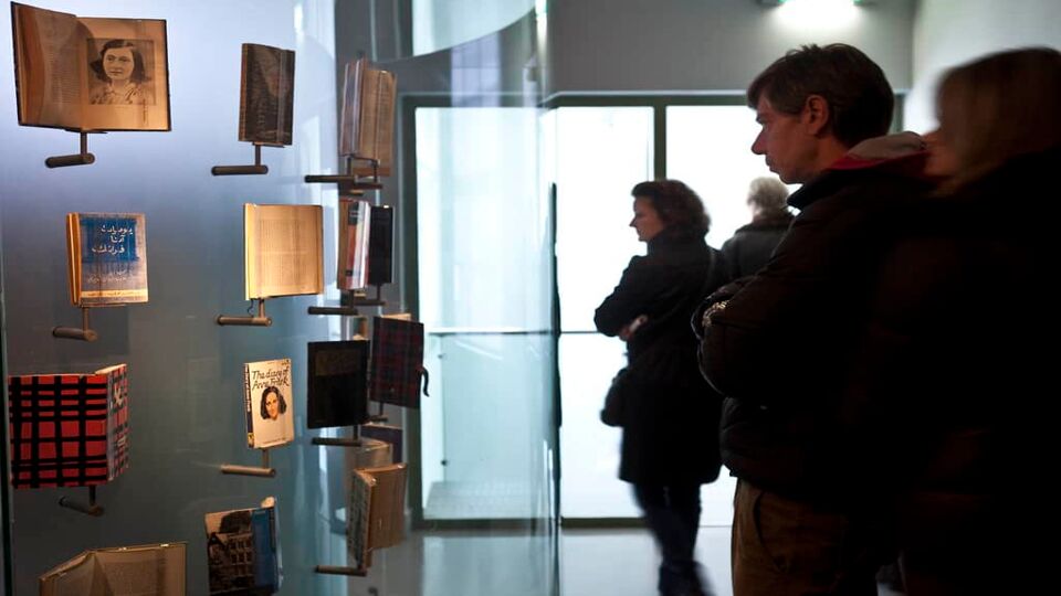 people looking at exhibits