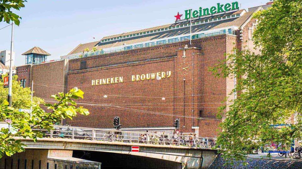 Exterior view of the Heineken Brewery – an imposing tall red brick building