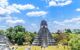 view over Maya pyramids and temples in national park Tikal in Guatemala