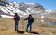 Two people hiking in the mountains