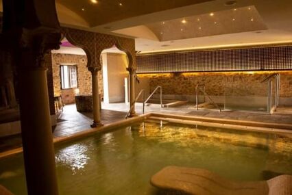 An indoor stone swimming pool