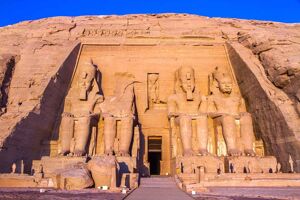 Exterior facade of the great temple showing four giant statues guarding the door