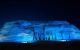 Abu Simbel temple lit up with blue light