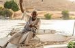 Old Nubian Man Sitting on Felucca Boat Deck and Sailing Down the Nile River