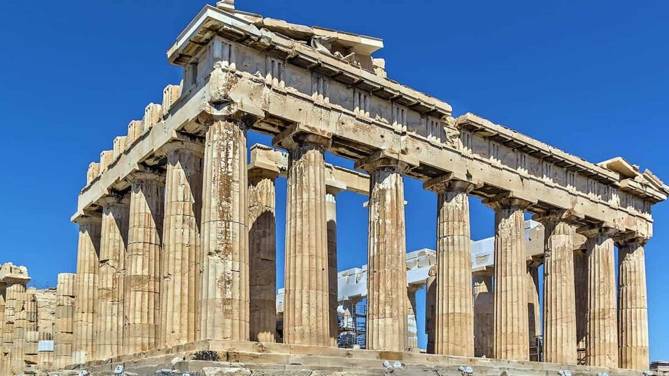 Parthenon temple in front of a blue sky