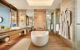 Large couples' bathroom with a bathtub