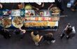 Birds eye view of people buying food from a stall