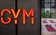 Neon sign reading 'GYM'