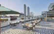 Riverside outdoor terrace with comfortable seating