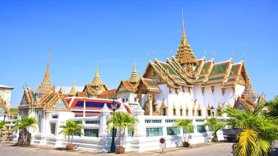 Gilded Grand Palace with a blue sky above