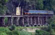 The 'Death Railways' train going over the Bridge over the River Kwai