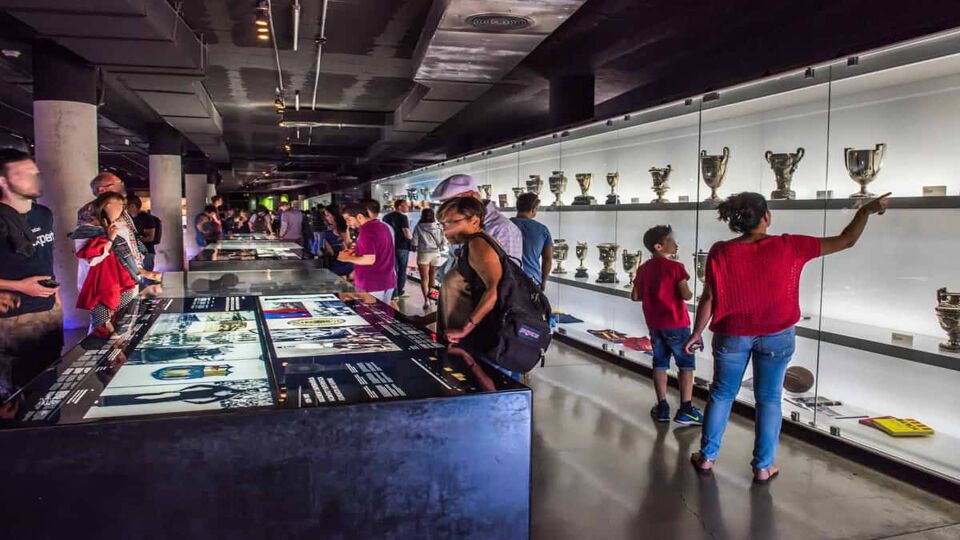 Visitors in the trophy room looking at exhibits
