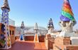 rooftop of Palau Guell with 5 colourful, tiled chimneys