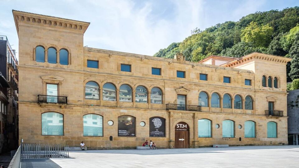 exterior facade of museum, golden sandstone