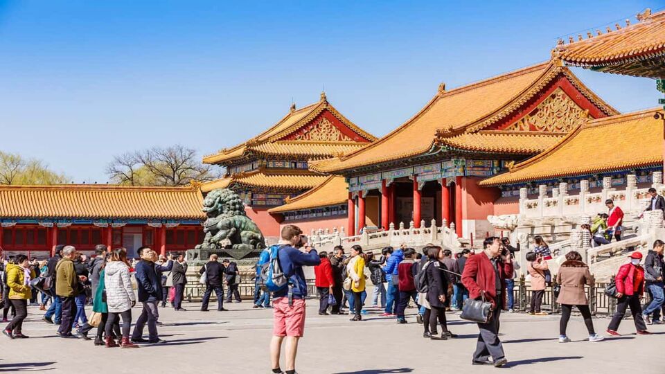 tourists throng outside the Hall of Supreme Harmony