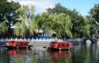 Chinese traditional tour boats travel in houhai lake in beijing, china