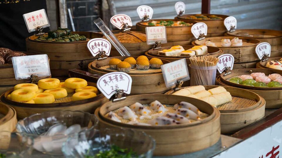 pots of dumplings on street stall