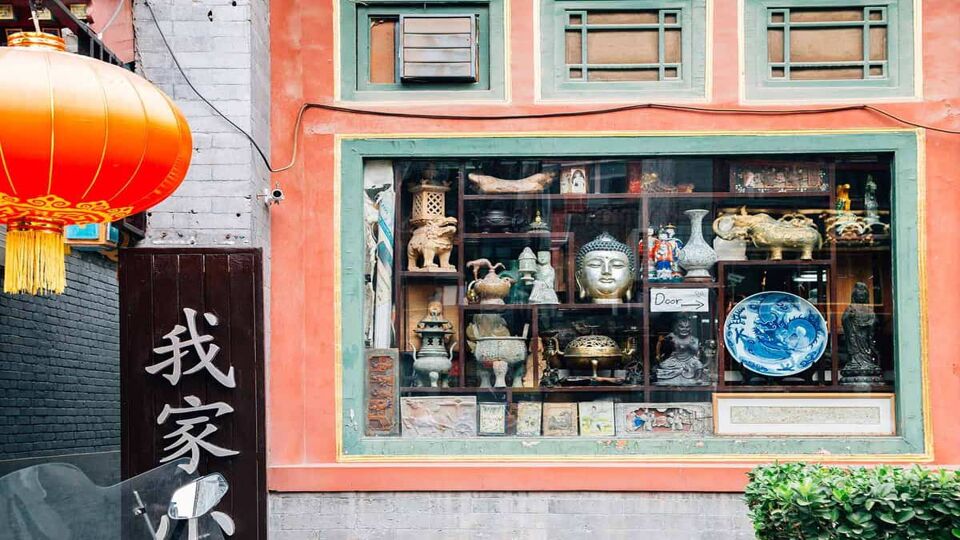 Shop window of antique shop in Beijing hutong