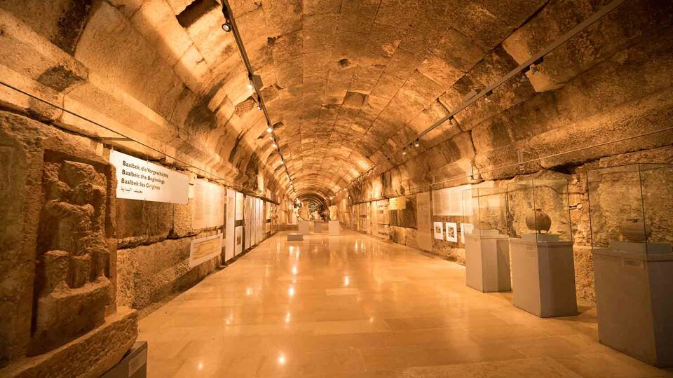 Long corridor with Roman artefacts on display in a tunnel under the Baalbek site