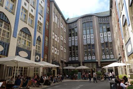 View into the court of the Hackesche Höfe with restaurants, bars and the Chameleon Theater in the Scheunenviertel quarter