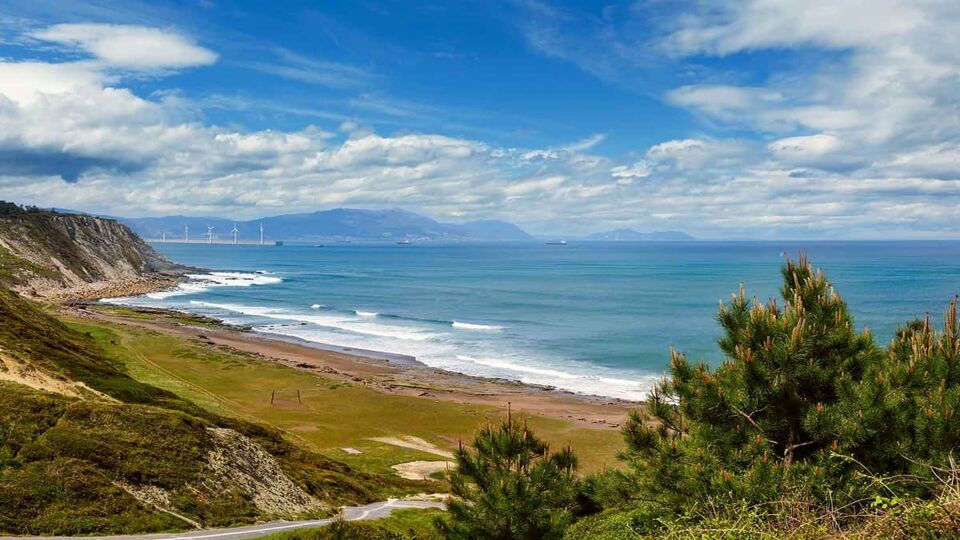 looking down onto the sweeping bay of Gorrondatxe Azkorri Beach