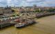 Aerial view of a sailing boat docked at the port of the moon