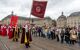 Parade of people in old fashioned medieval costumes