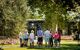 A group on a wine tour of a vineyard