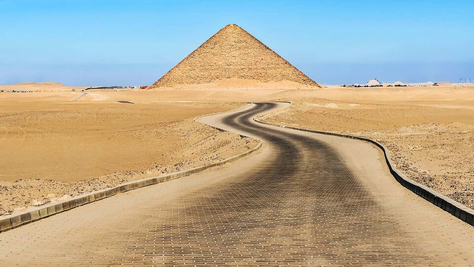 Visiting Red pyramid in Dahshur. It is also called the North Pyramid, is the largest of the three major pyramids located at the Dahshur necropolis in Cairo, Egypt.