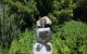 Bronze sculpture in the garden with blue sky background