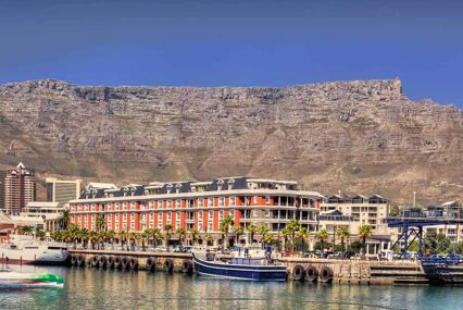 Distant view of the harbour and a mountain range in the background