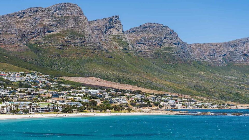 Shot of Camps Bay from the Atlantic ocean in the foothill of Twelve Apostles mountain
