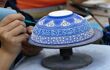Close up of person painting ceramic pottery in Avanos, cappadocia