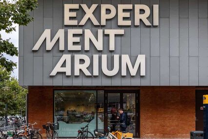 A sign for the Experimentarium, an interactive science museum