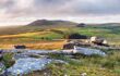 The rugged terrain of Bodmin Moor in Cornwall, withthe peaks of RoughTor and Brown Willy in the distance