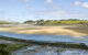 view from the camel trail cycleway and footpath along disused railway line the estuary of the river camel padstow and rock cornish coast cornwall england uk