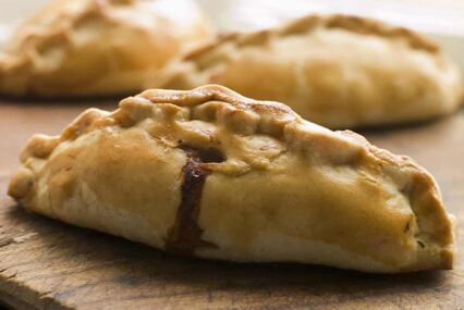 side angle of a newly cooked traditional Cornish Pasty