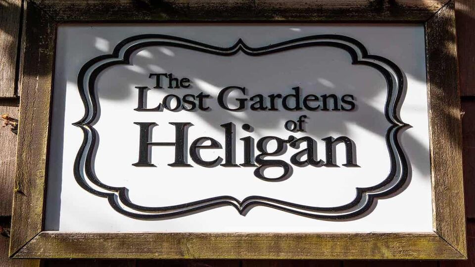 A sign at the entrance to the beautiful Lost Gardens of Heligan in Cornwall, UK.