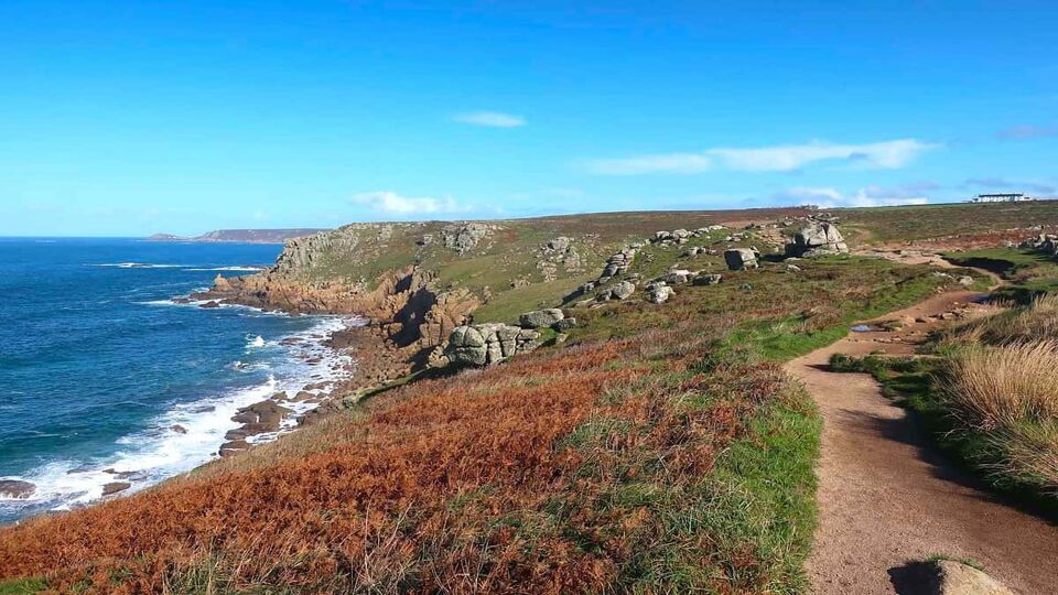 View of a hiking path along clifftops in Cornwall