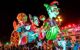 Large floats at a nighttime carnival