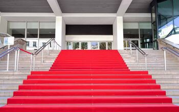 steps and red carpet at entrance to Palais Festival in cannes