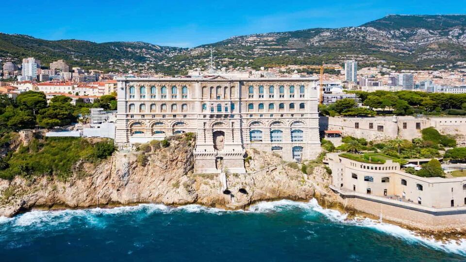 Exterior of grand, ocean-front museum perched directly on a cliff