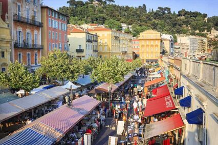 View looking down from above to the busy market of Cours Saleya in the centre of Nice City