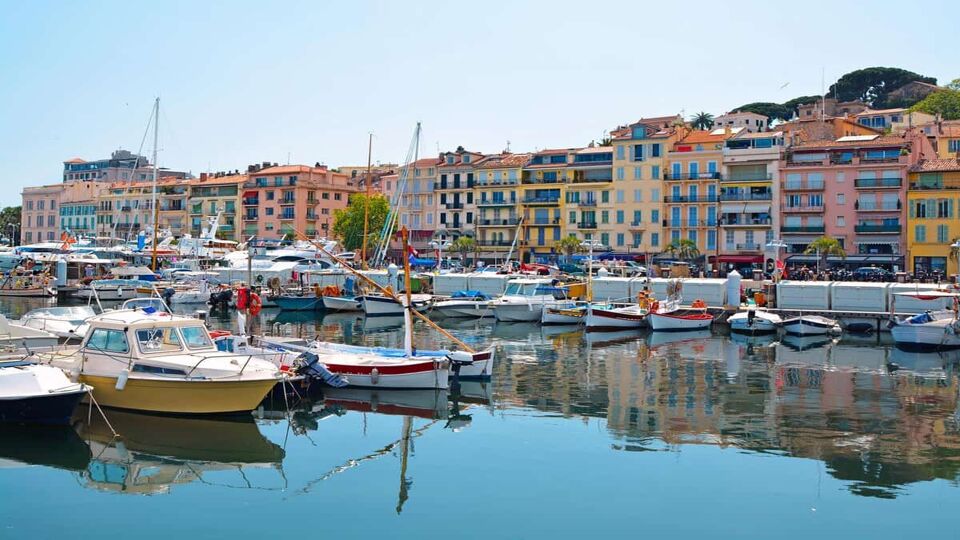 View of Saint-Tropez's small marina with restaurants and shops