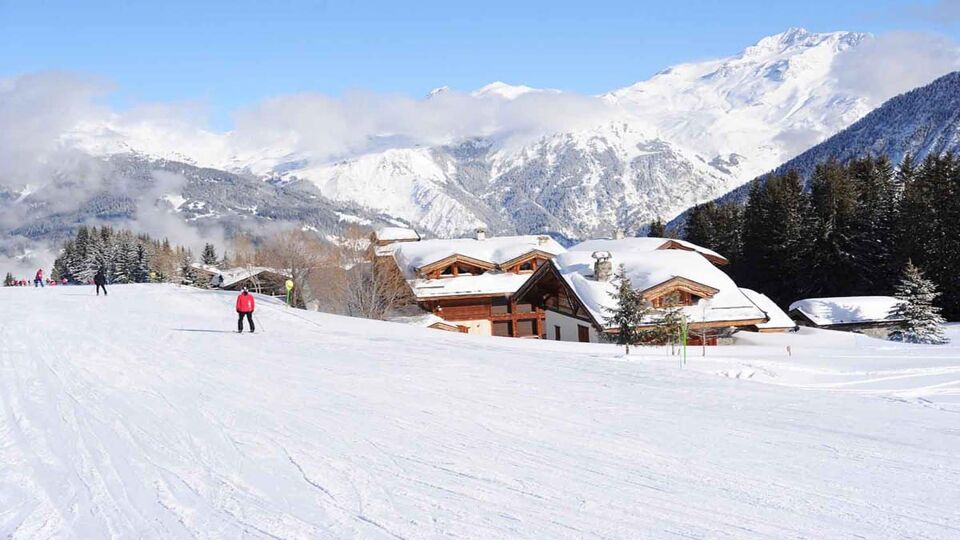 Courchevel village slopes under snow by winter
