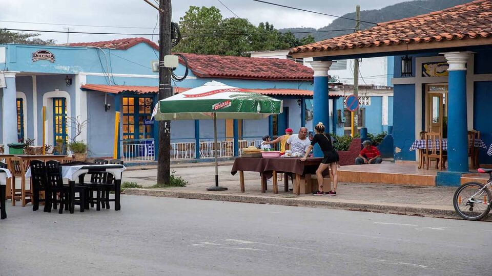 Local people and tourists in the streets of Vinales. It is a small town in Pinar del Rio.Local people rent a room of their house for tourists.